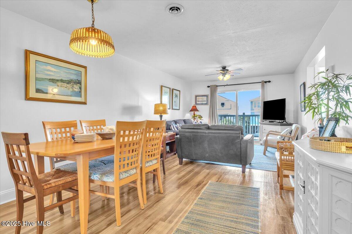 2714 W Beach Drive # 106, Oak Island, NC 28465 – photo 8: Open concept Dining/LR