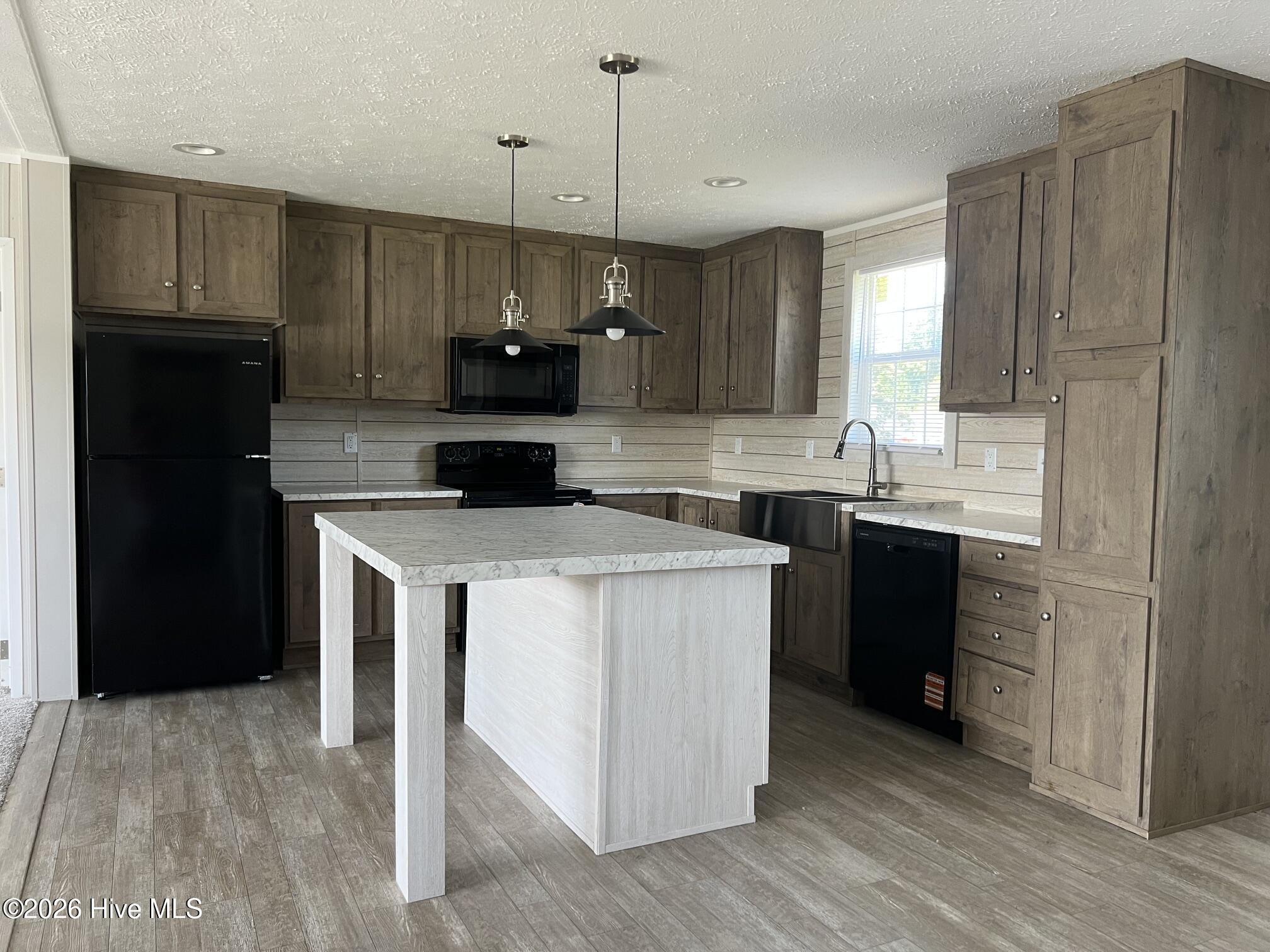 Center Work Island with Built-in Cabinets & front Breakfast Bar, Bar-Top Seating