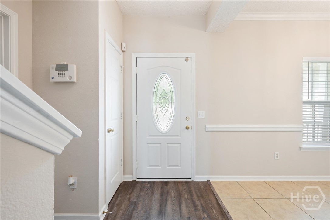 Enter in and notice the tall ceilings.