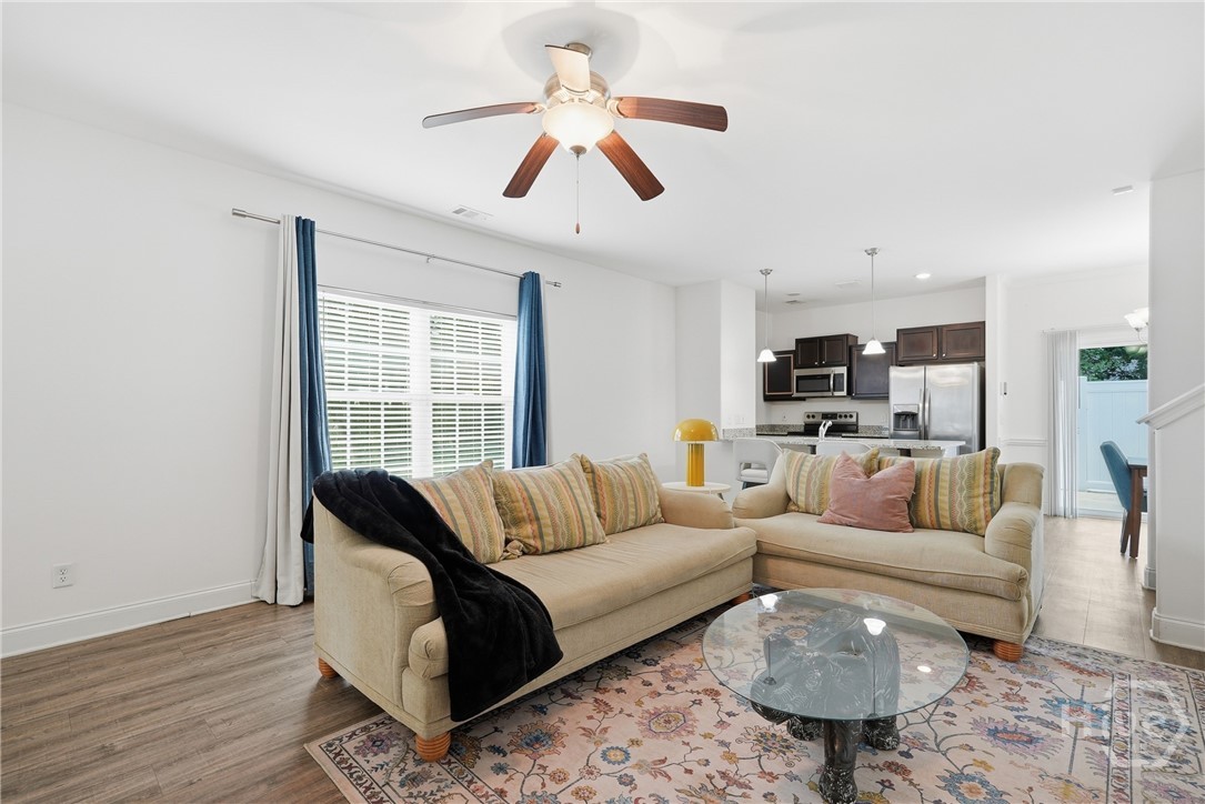 Large windows face the endless marsh views.