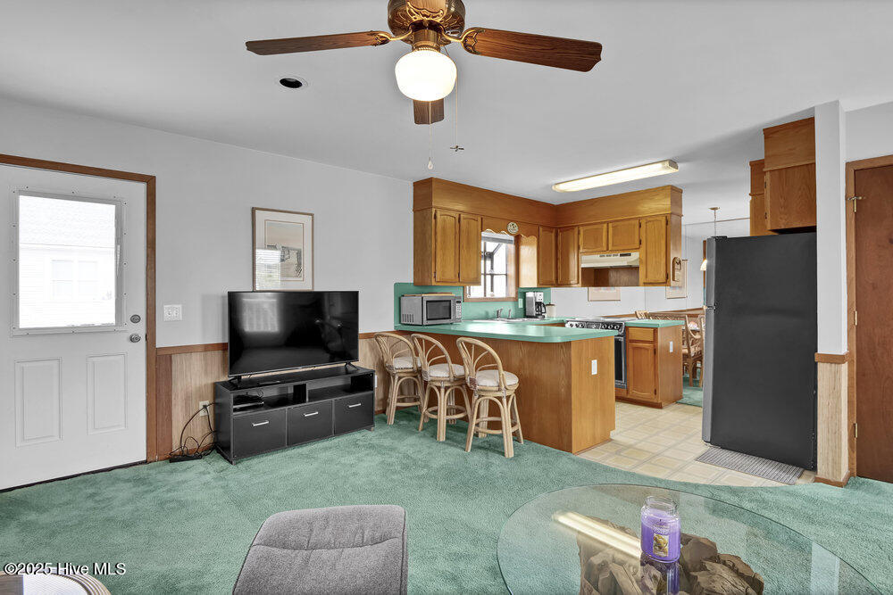 308 N Shore Drive E, Sunset Beach, NC 28468 – photo 11: Living Room