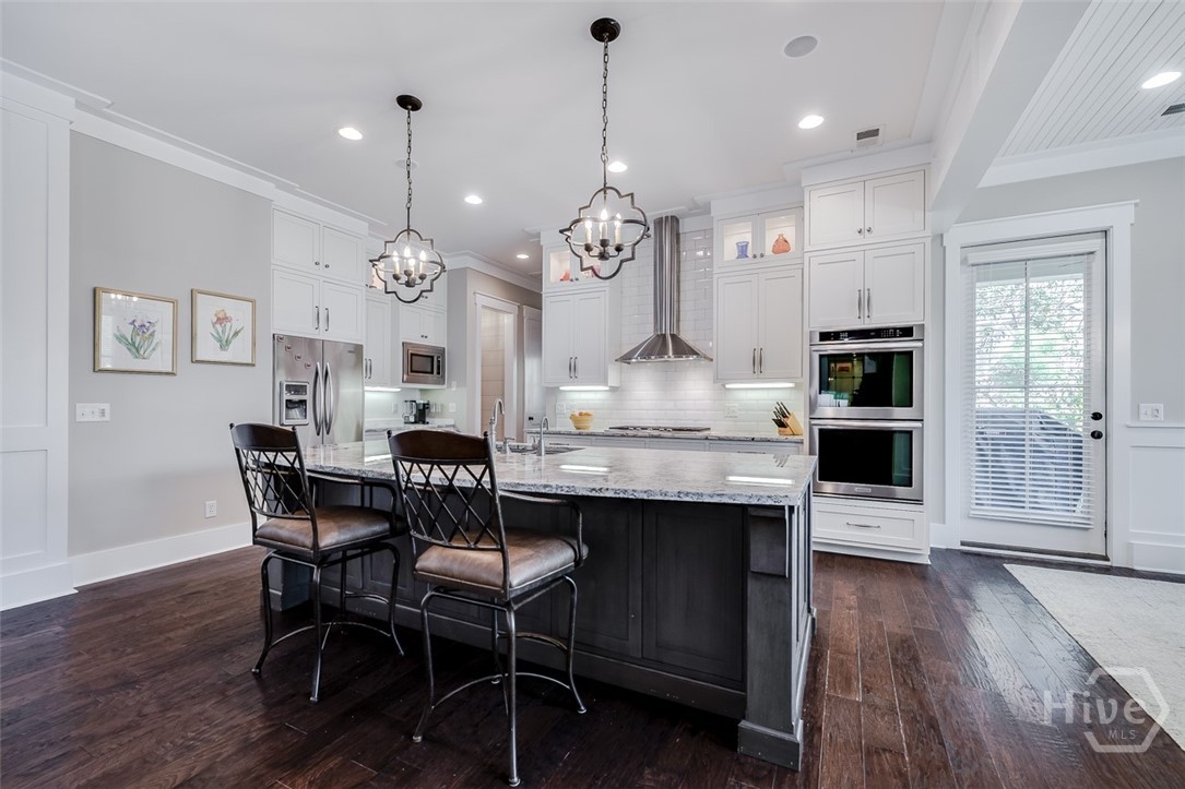 Island kitchen with granite countertops