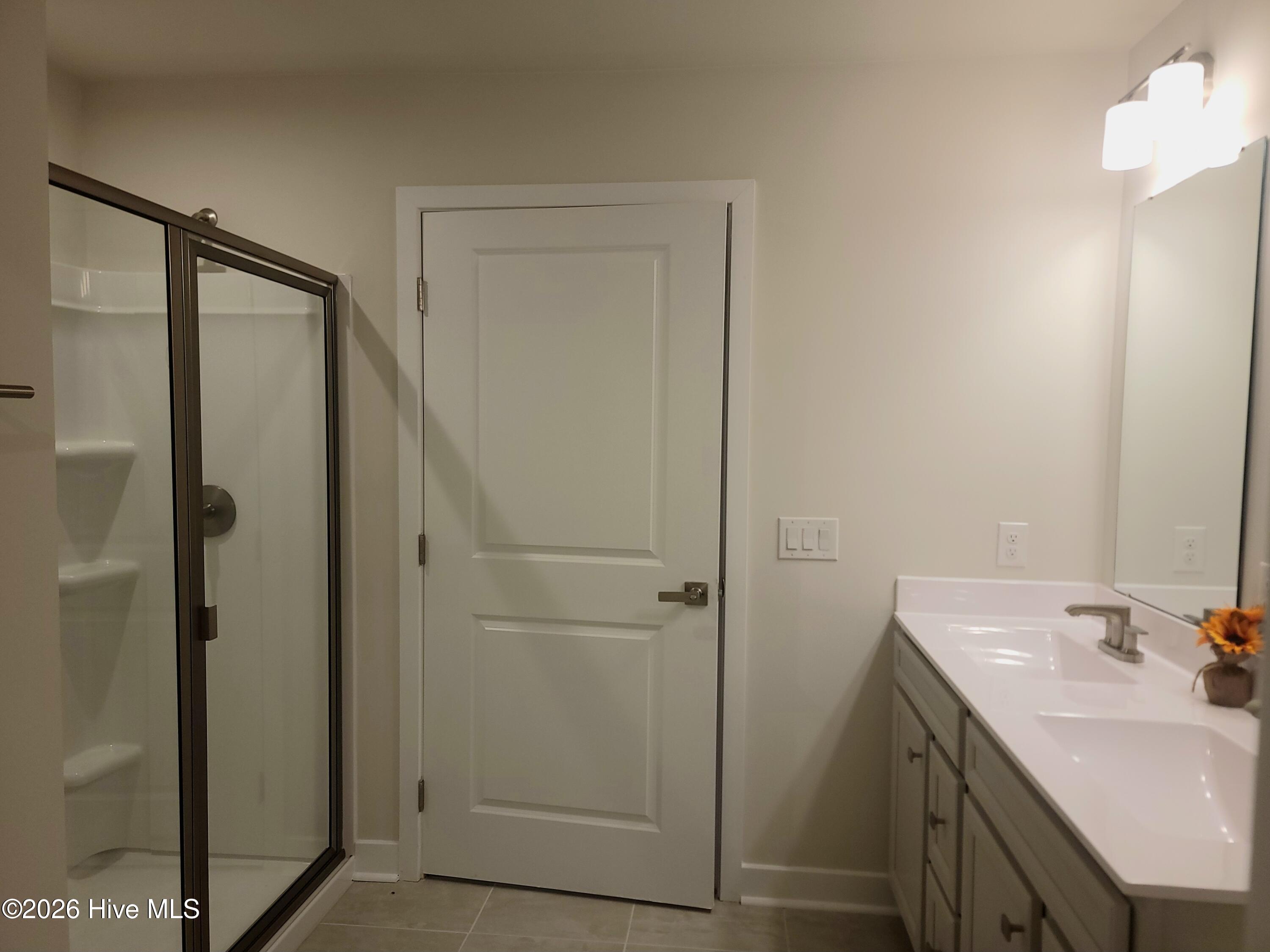 Primary Bathroom with large walk in shower.
