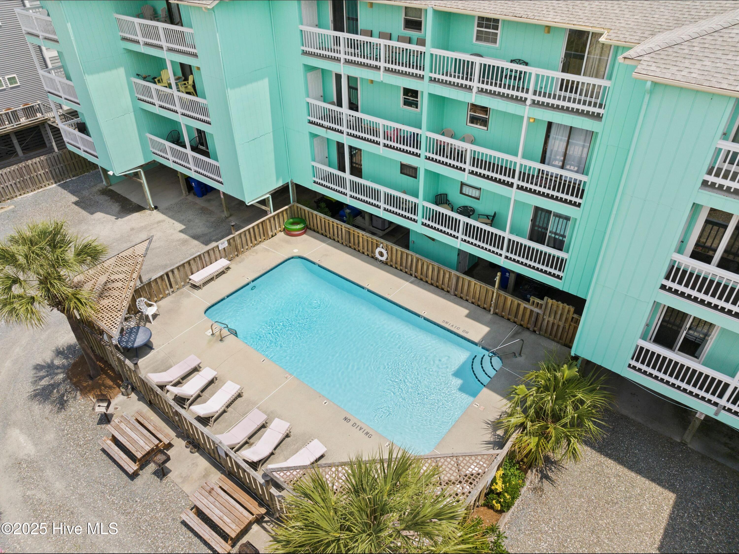 1013 Carolina Beach Avenue N 1f, Carolina Beach, NC 28428 – photo 22: mls-DJI_20250520090506_0003_D
