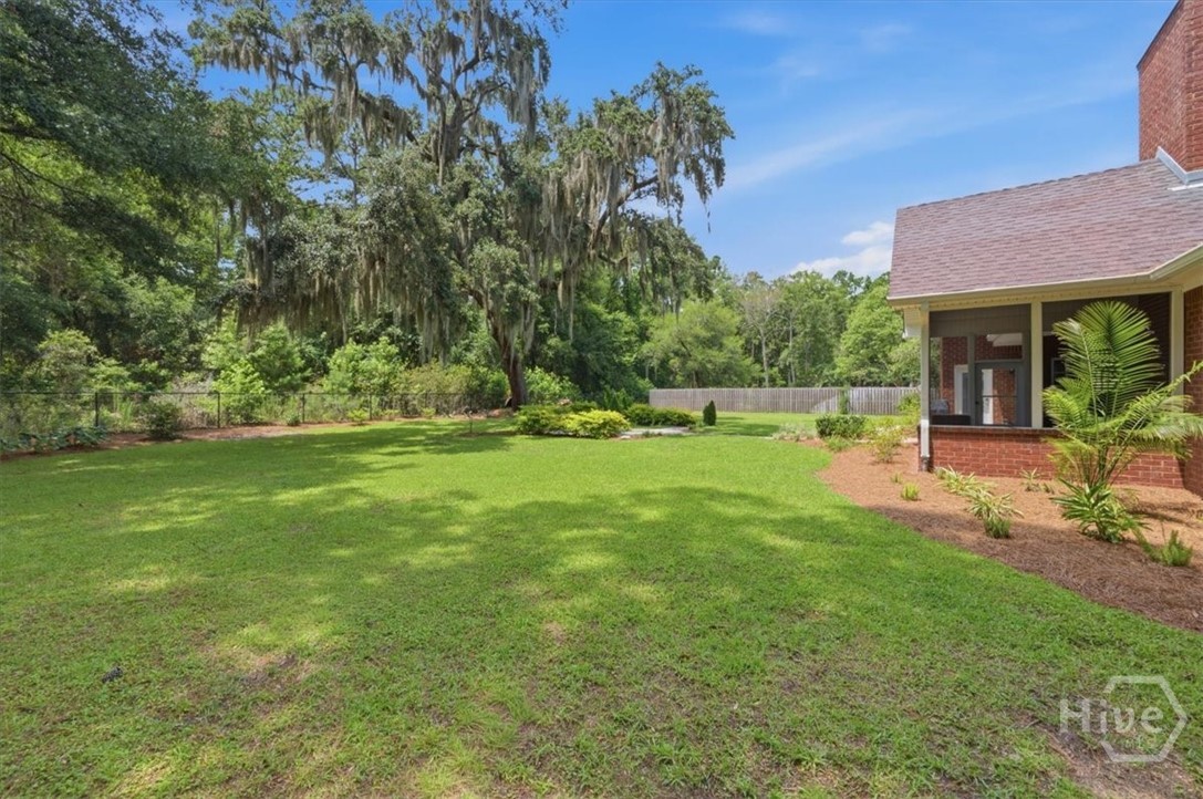 Large fenced back yard.