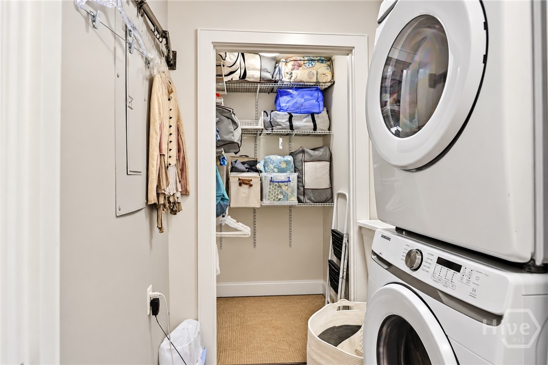 Laundry Room on upper level with sink on side of W&D. Closet is also elevator shaft