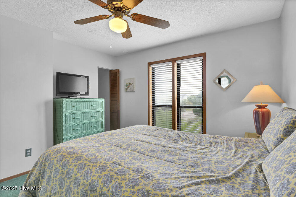 308 N Shore Drive E, Sunset Beach, NC 28468 – photo 24: Bedroom 2