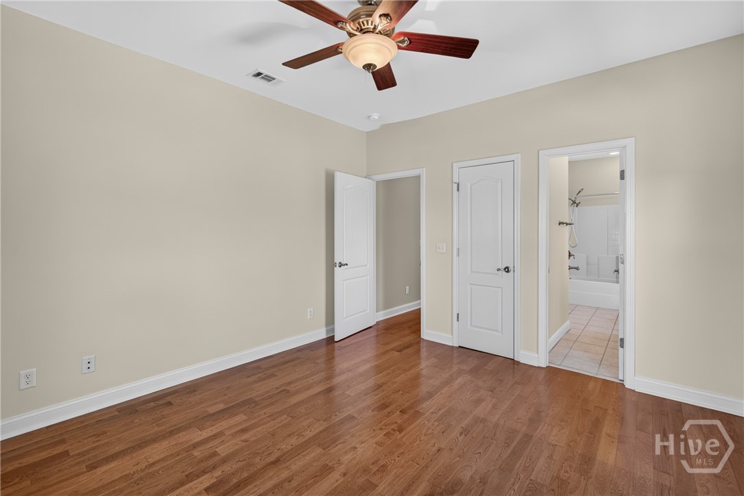 3rd bedroom with entry into 2nd bathroom.