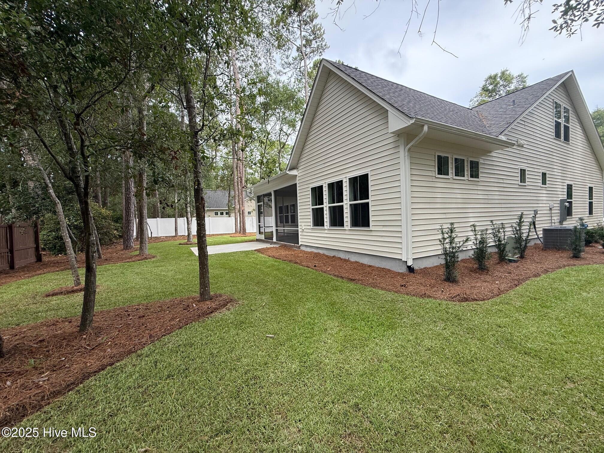 9058 Ocean Harbour Golf Club Road SW Homesite 15, Calabash, NC 28467 – photo 14: backyard 2
