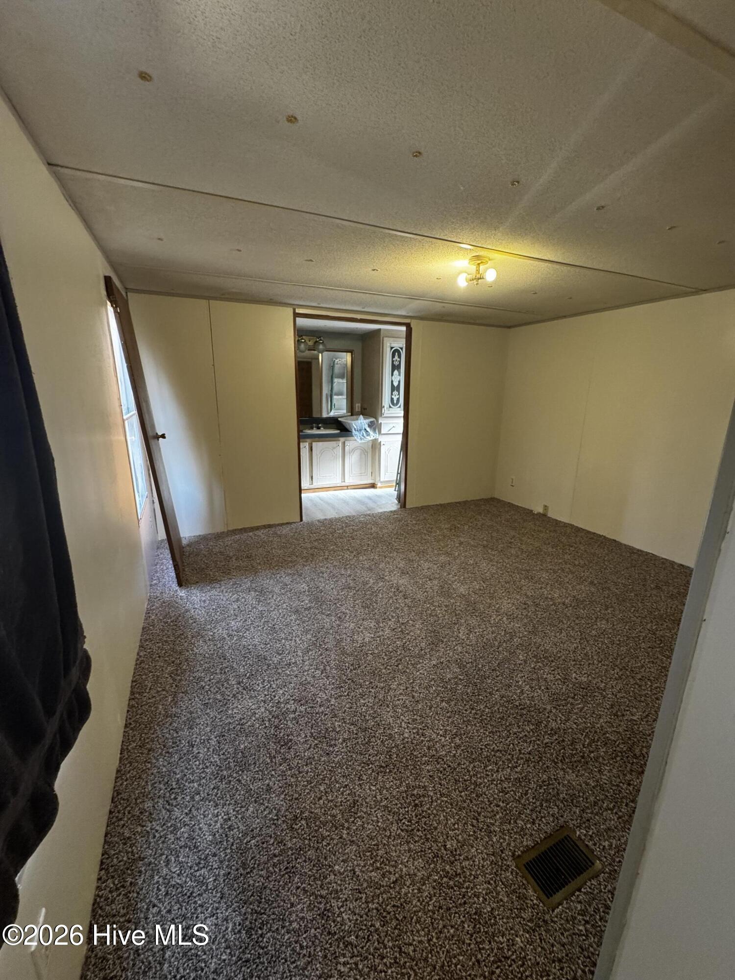 Primary bedroom with new carpet
