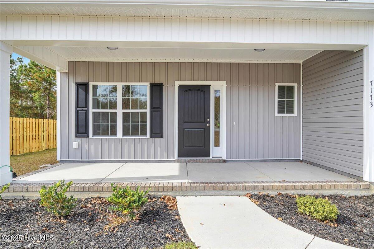 143 Bayside Drive 22, Sneads Ferry, NC 28460 – photo 6: 007-Final Sample Model Home Compl-RJREM-