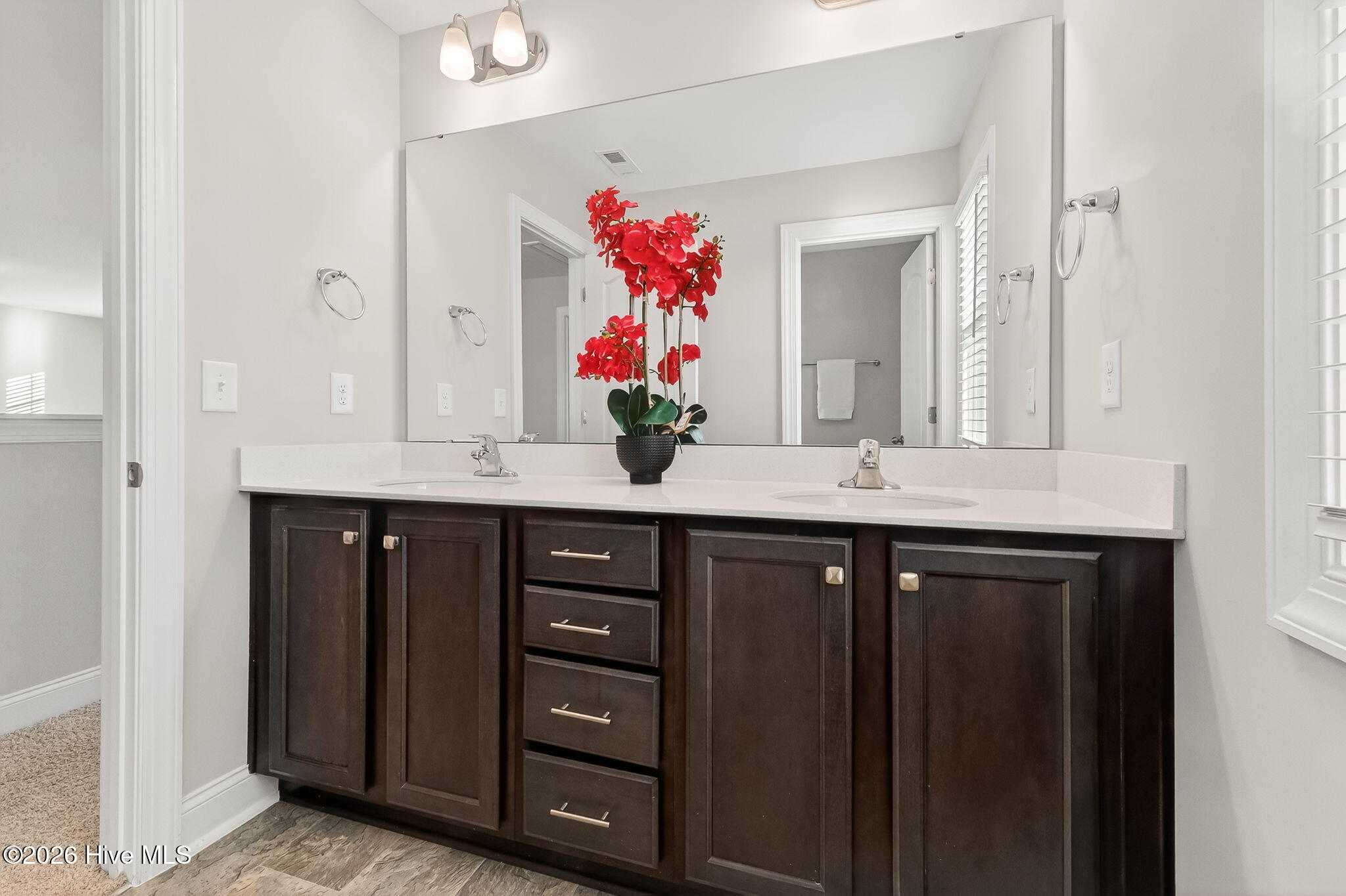 His-n-hers vanities in Owners bath