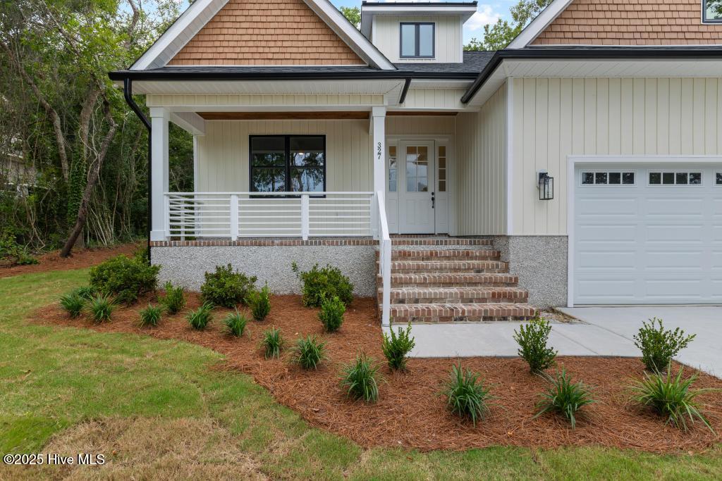 327 S Belvedere Drive, Hampstead, NC 28443 – photo 2: 425A1031