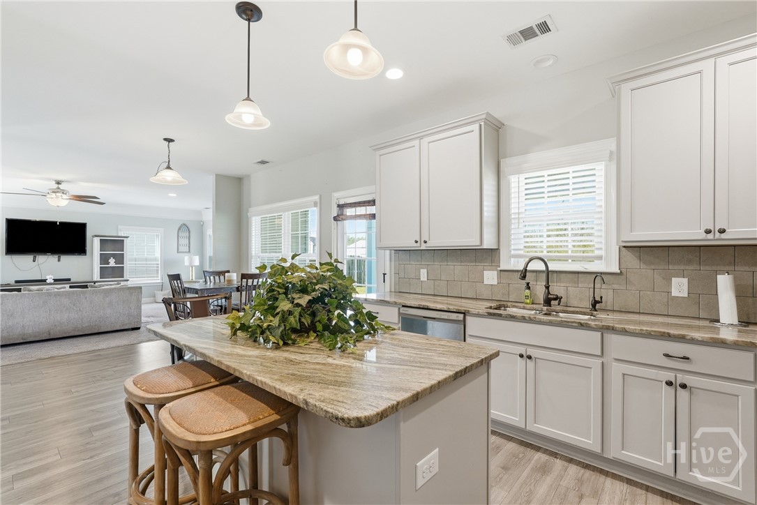 Island adds extra seating as well as prep space