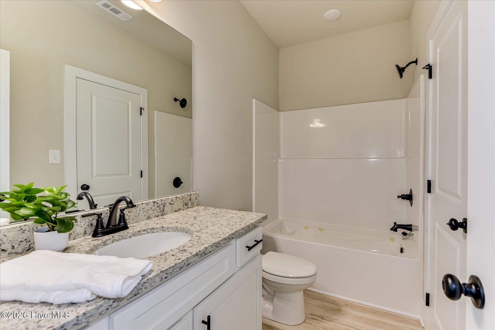 Full bathroom shared by Bedrooms 2 and 3