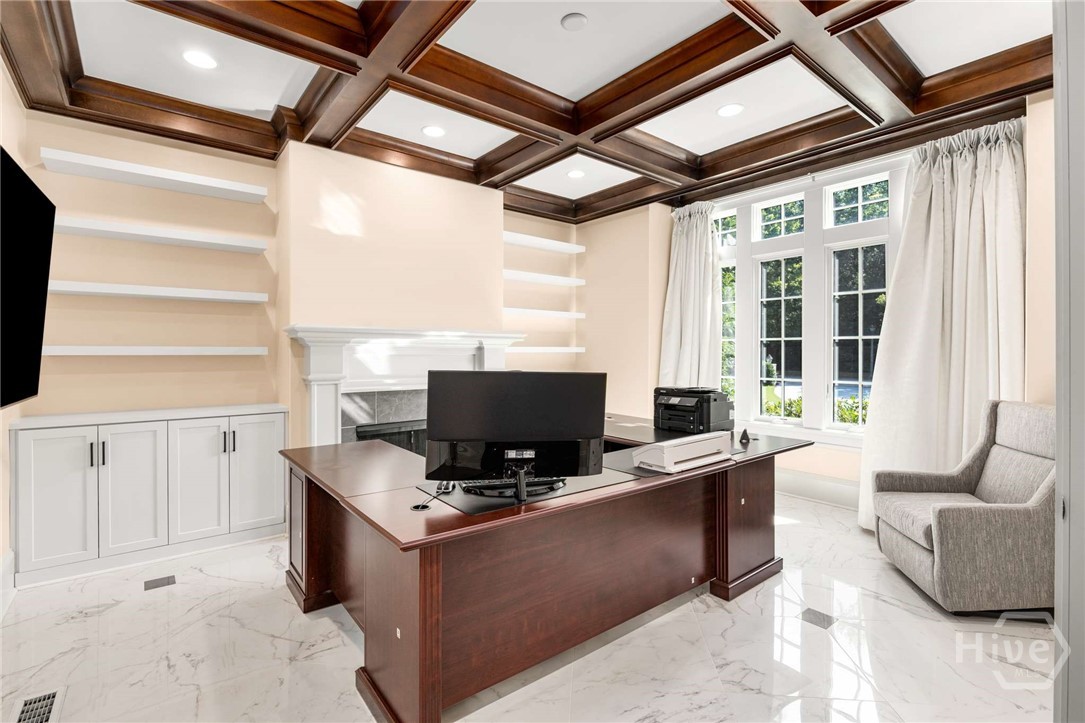 Beautiful Fireplace and Built ins in Office!