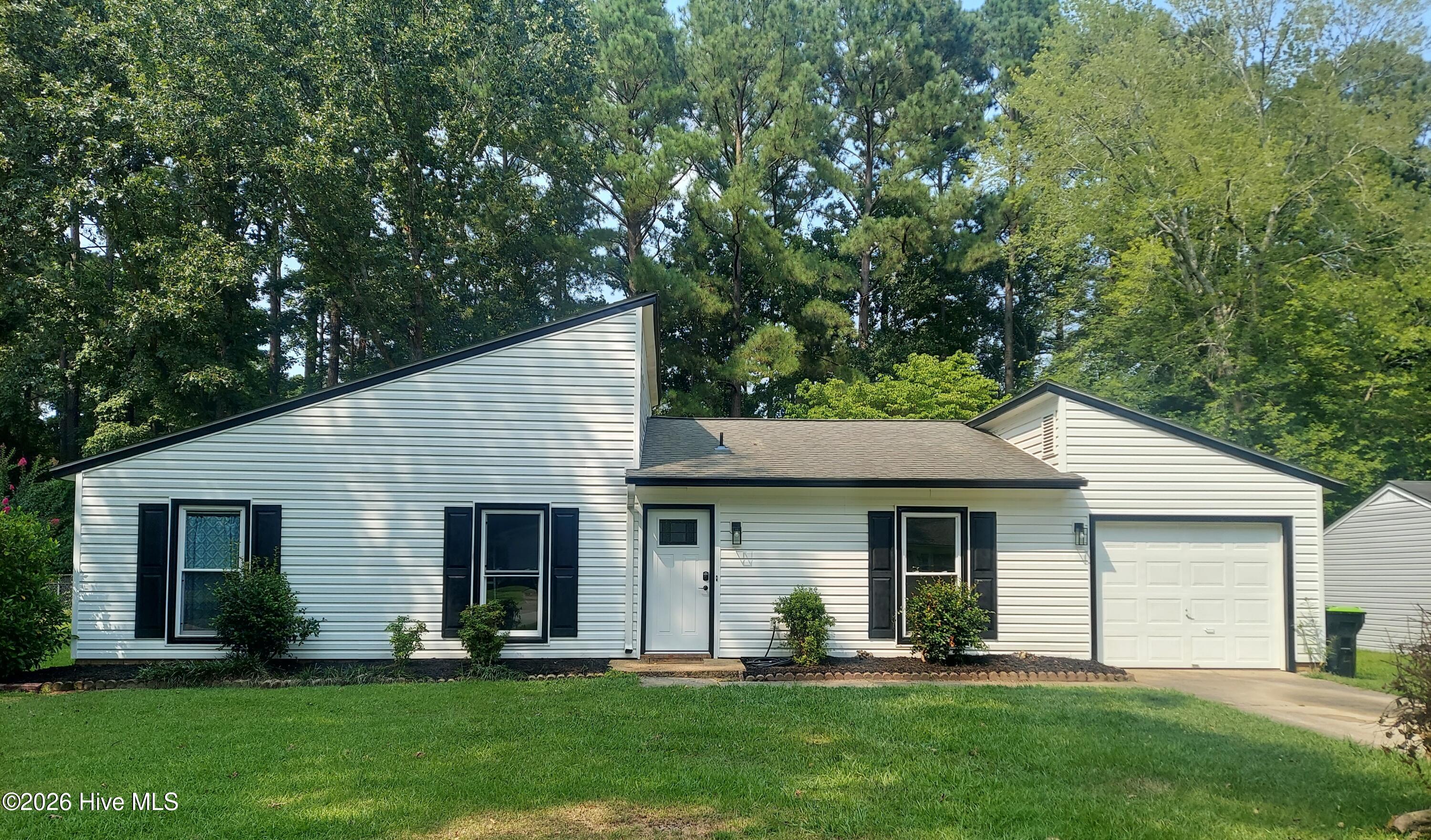 A residential charmer awaits you in New Bern's Colony Estates!Carefully and recently Renovated and updated (2026), this beautifully rendered 3-bedroom residence has been and finished with taste & finesse! Welcome yourself home to a fantastic ''like-new'' opportunity which awaits your consideration! Conveniently located for everything in town yet comfortably located on a quiet street away from the hustle and bustle of Glenburnie Road. This is a warm and cozy home with a striking contemporary exterior which yields to an invitingly open and airy interior soon after walking through the front door! There is so much to appreciate in the house, the results of the thoughtful and tasteful structural improvements and interior remodeling! New doors (including hardware the rear slider), windows, electrical outlets and fixtures, kitchen cabinets and lovely granite counters, refrigerator, stove & microwave... new water heater... Newly renovated bathrooms (inclusive of tubs sinks and fixtures), new luxury vinyl floors throughout the home, as well as having been freshly painted, new gutters and more!! This residence truly feels like a home recently built especially for you!! The living room functions as a multipurpose space for dining, visiting and relaxing in front of the gas fireplace. The kitchen communicates with the living area across a large granite counter for the cook to enjoy company yet has a prep area tucked around the corner. You'll love the view of the private backyard. It's partly shaded, but should also make a great spot for gardening, kids and pets! The bedroom wing features three bedrooms off the hall, with the master located on the back corner with its ensuite bath! Please take a look soon at this affordable value and a real investment opportunity for the future!