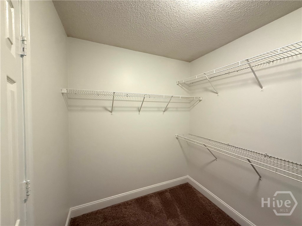 MASTER BEDROOM WALK IN CLOSET