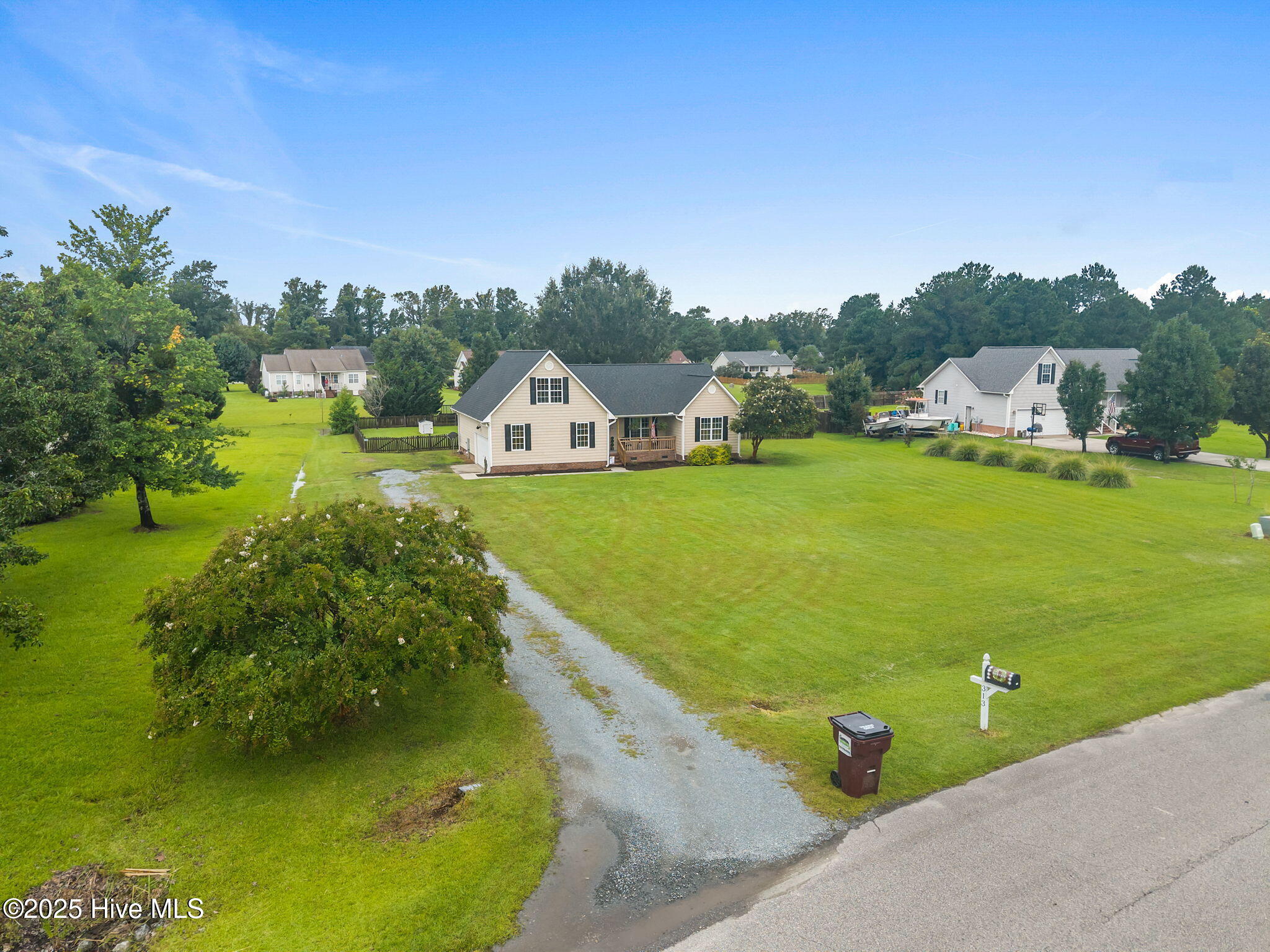 313 Oakmont Drive, Hampstead, NC 28443 – photo 16: 16-web-or-mls-DJI_20250811101534_0207_D