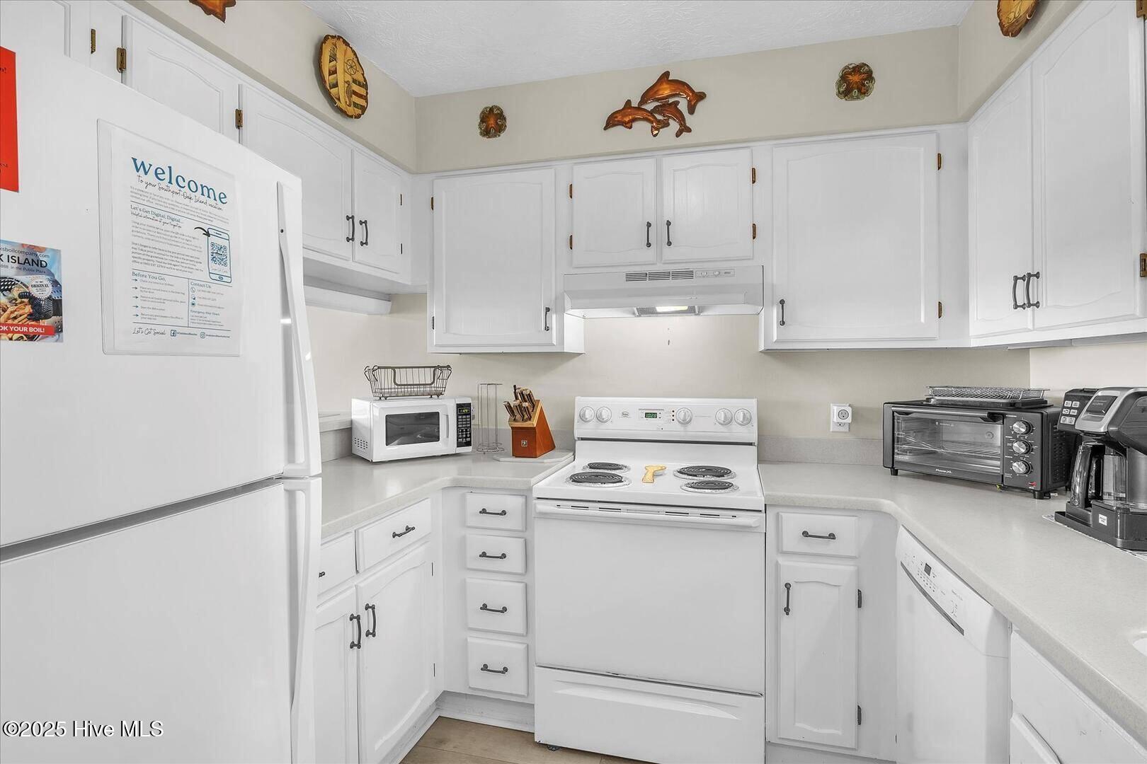 1000 Caswell Beach Road, Oak Island, NC 28465 – photo 21: 1000 Caswell Beach Road 1303 Kitchen
