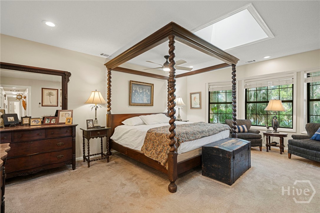 Primary bedroom overlooking the water