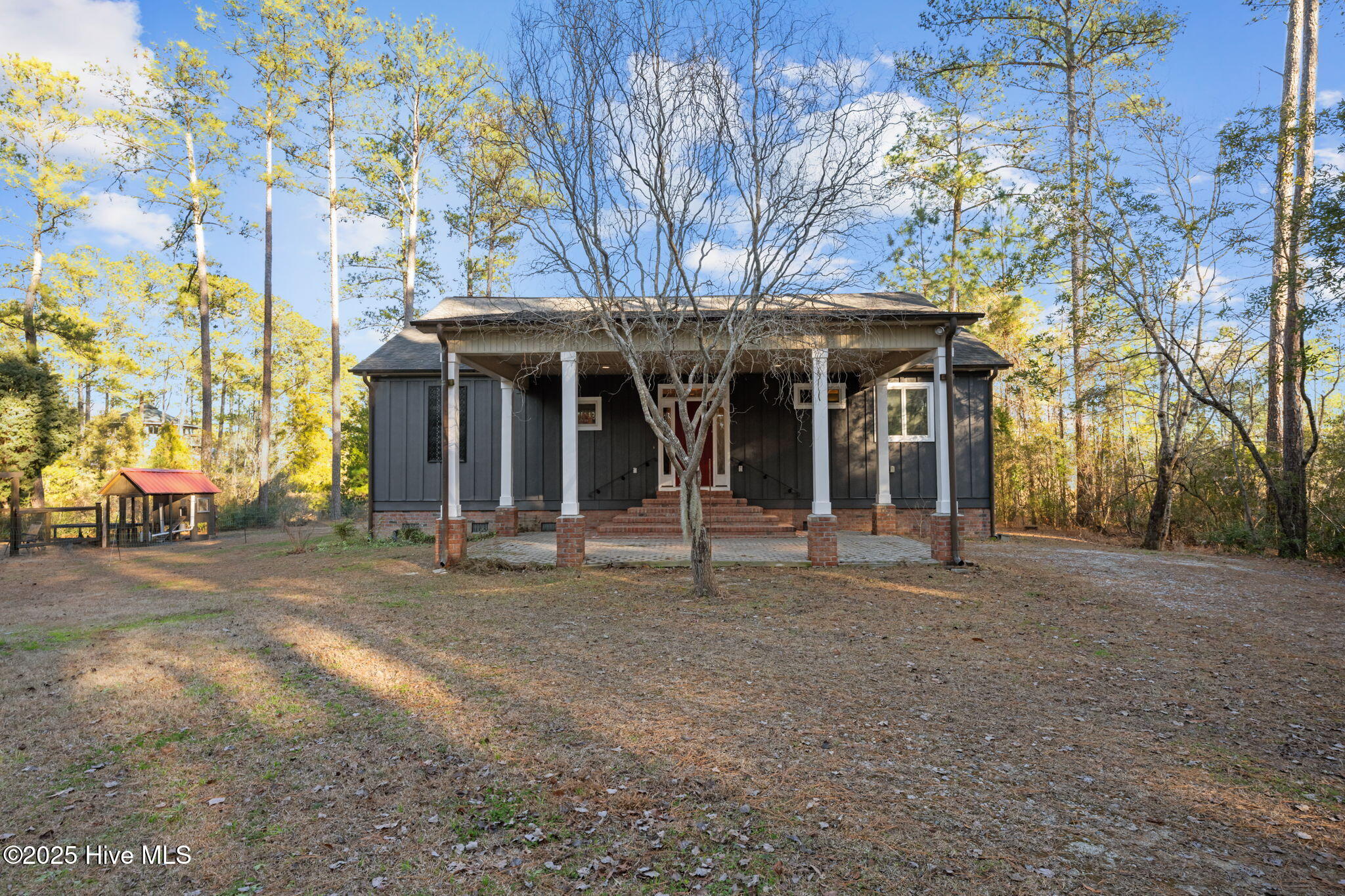 Front of the house includes and covered car port