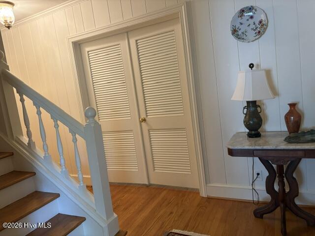 front door entry foyer - louvered doors conceal dining room