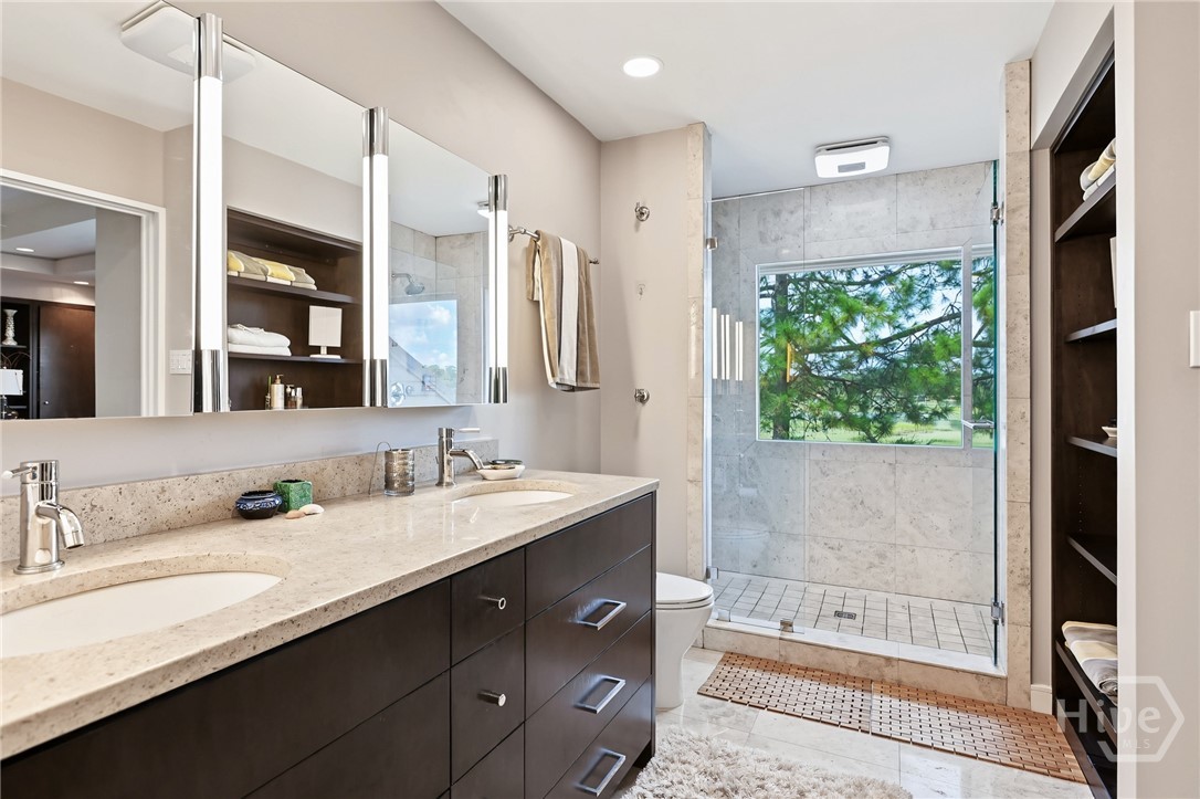 Primary Bathroom with double vanities and huge shower