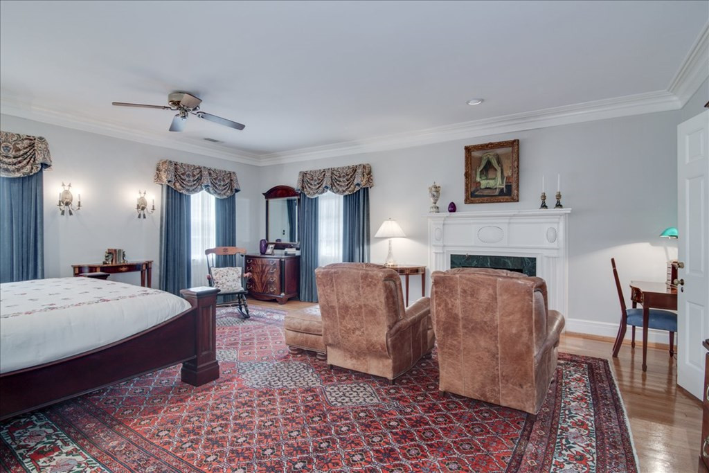 Owner's suite offers large bath, balcony & study