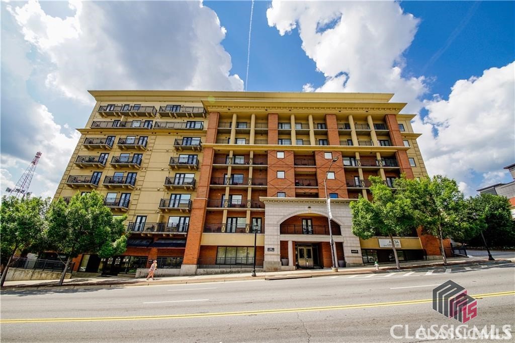 Largest One Bedroom One Bath. Corner Suite with view from balcony to Downtown Athens, GA West towards Varsity & North towards Clayton St. All GAMEDAY condos are fully furnished with all the furniture, linens, appliances, electronics, and household items included in the price. Some artwork and personal items are not included in the sale. Georgia's GAMEDAY Center is the only property in Athens, GA with 24/7 Front Desk Staff acting as concierge with on site housekeeping & on site handyman. Security cameras throughout the building and 5 level on-site parking deck. OPTIONAL on-site management company will lease the condo for you when you are not there. The on-site management company leases nightly, weekly, monthly & long term. Walk to Sanford Stadium and UGA campus. Association dues cover water, sewer, and trash pick up, common area maintenance, insurance on building, hi-speed internet access, extended satellite television, security, and parking.