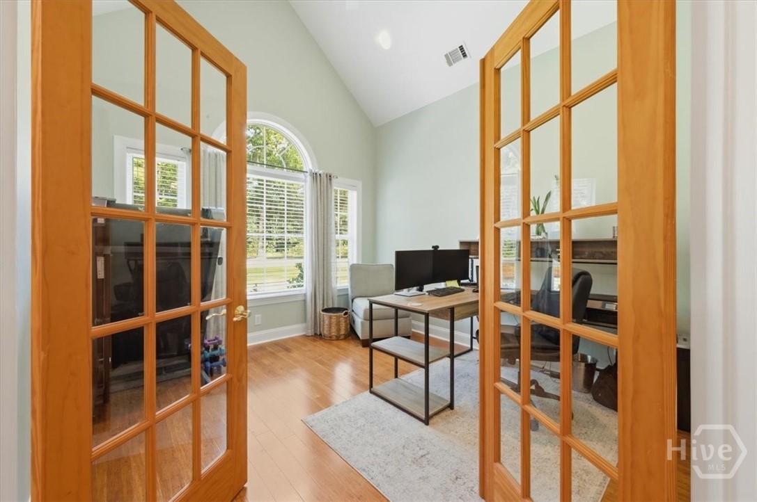 French doors lead to the separate office.