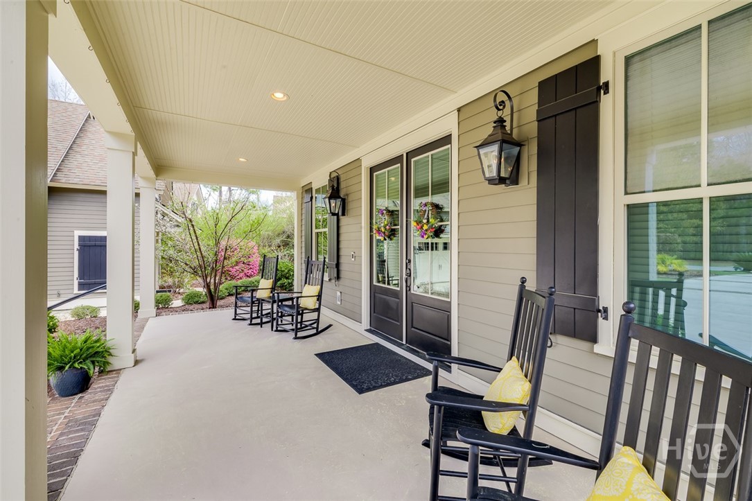 Rocking chair front porch with solid wood doors