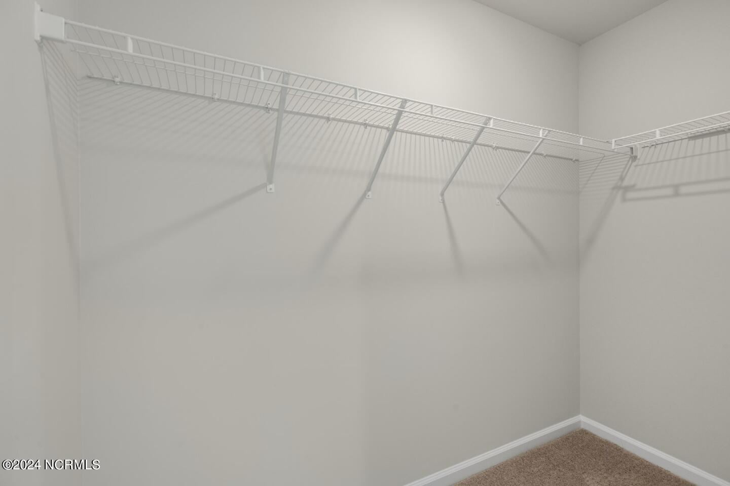 7098 Dunford Road Unit 130, Leland, NC 28451 – photo 15: Walk in Closet in Primary