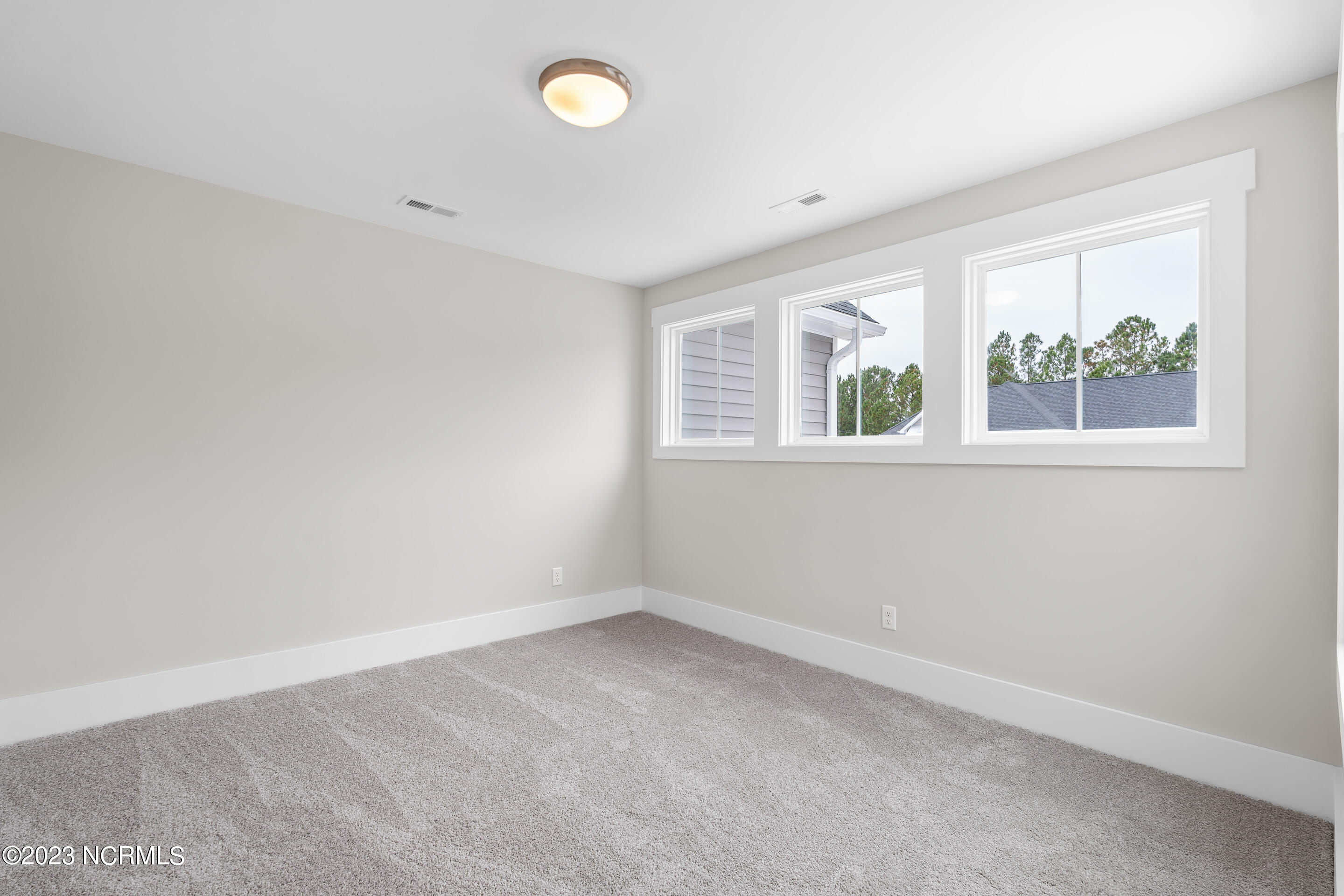 7447 Springwater Drive, Wilmington, NC 28411 – photo 15: 7402 Springwater Dr. MLS-17