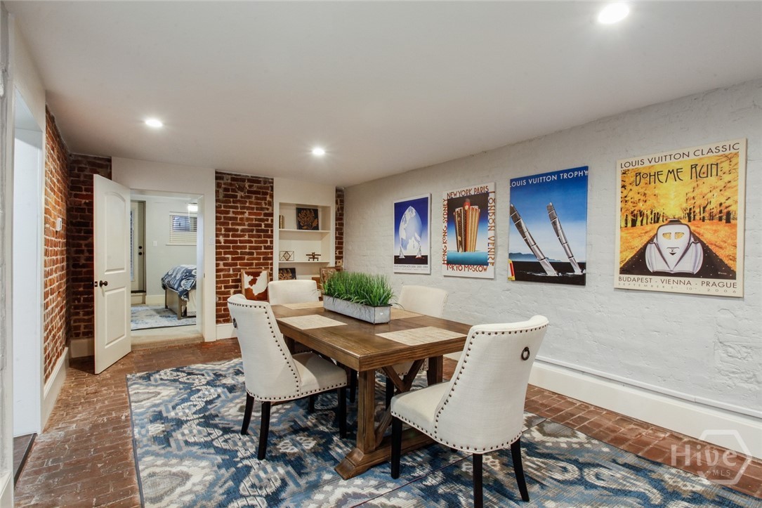 Living room flows seamlessly to the dining room.