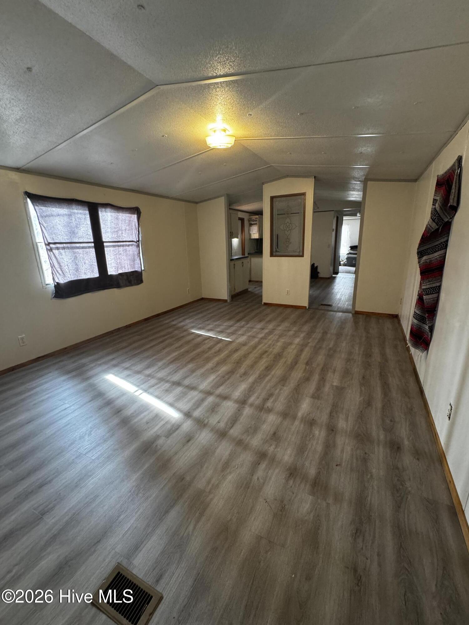 Living room with updated plank flooring