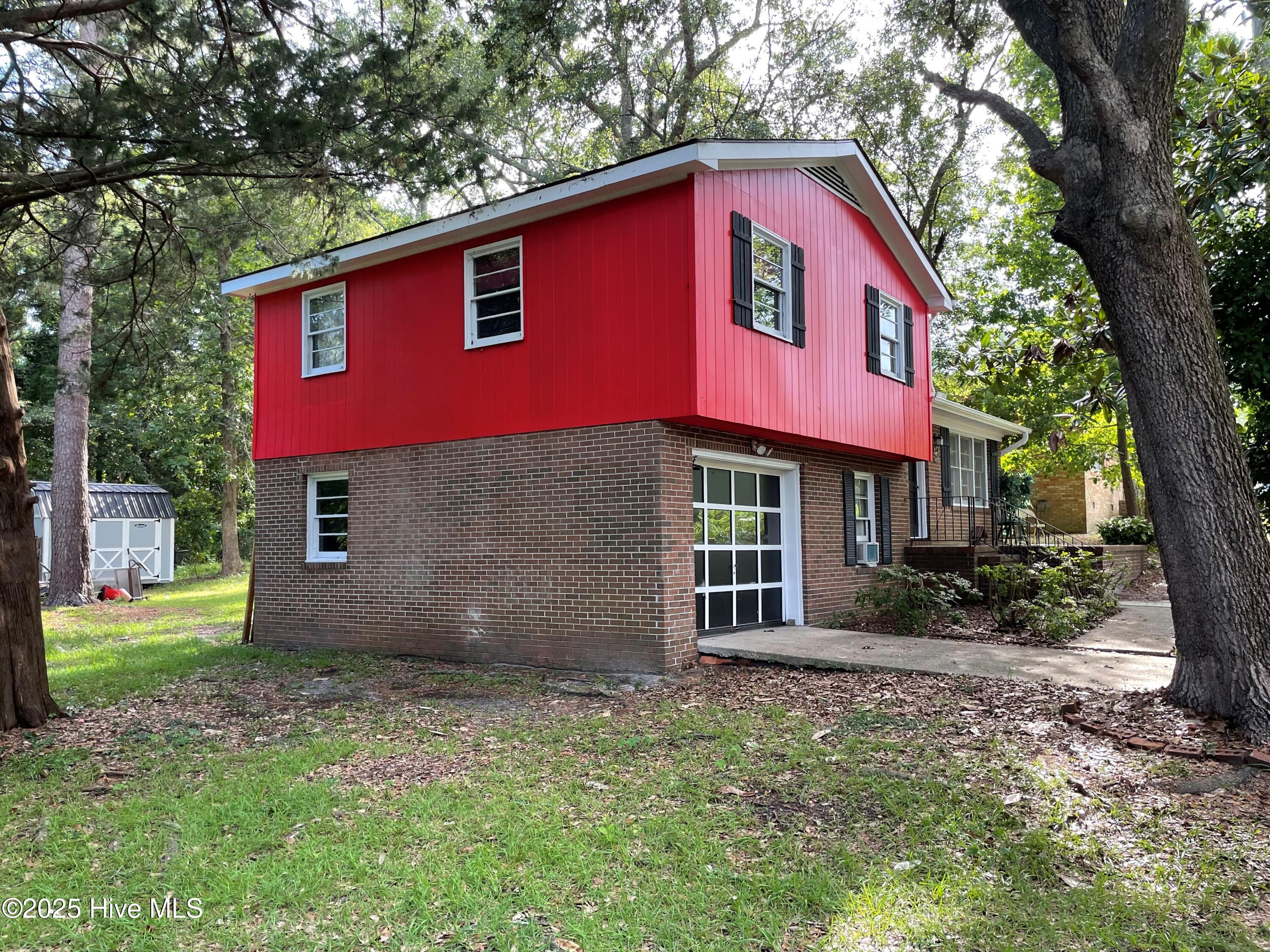 134 Channel Haven Drive S, Wilmington, NC 28409 – photo 2: 134 Garage Side