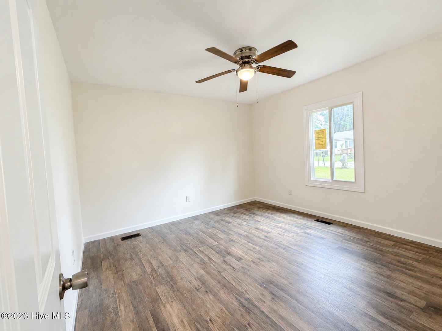 25_empty_cozy_bedroom_with_natural_light