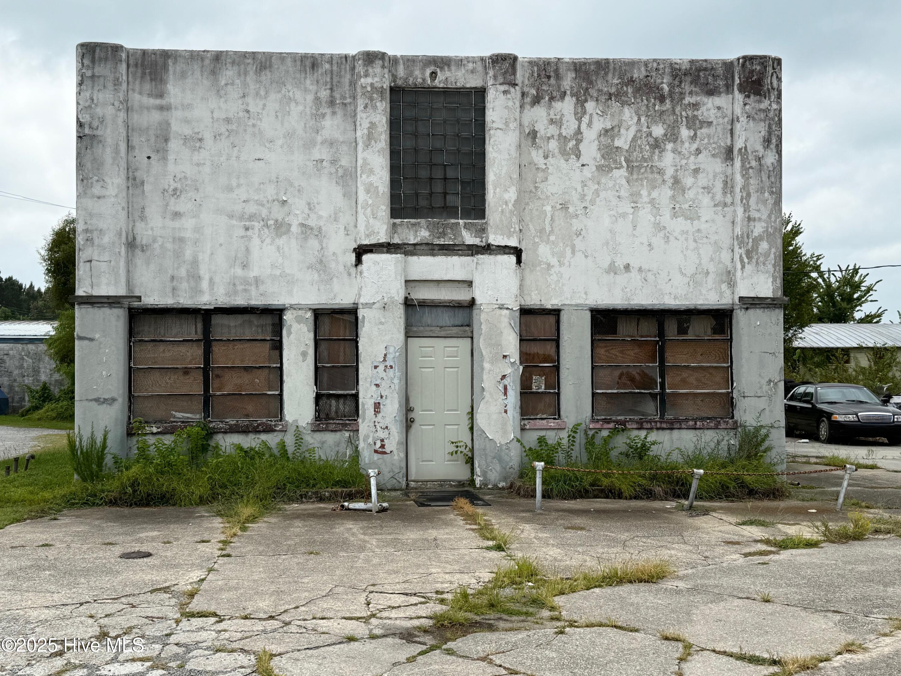 Looking for a space that's more than just square footage? How about a solid concrete structure steeped in history and right in the heart of Robersonville. This building isn't just built to last—it's built to inspire.  Your blank canvas awaits......
It is priced to move, with room to grow!

Don't miss out on this rare opportunity to transform a timeless structure into something extraordinary. The property has stories to tell—and it's waiting for yours.

 Contact us today to schedule a tour and see the potential for yourself!

Seller is offering buyer a $3,000.00 allowance for the clean out of the building.