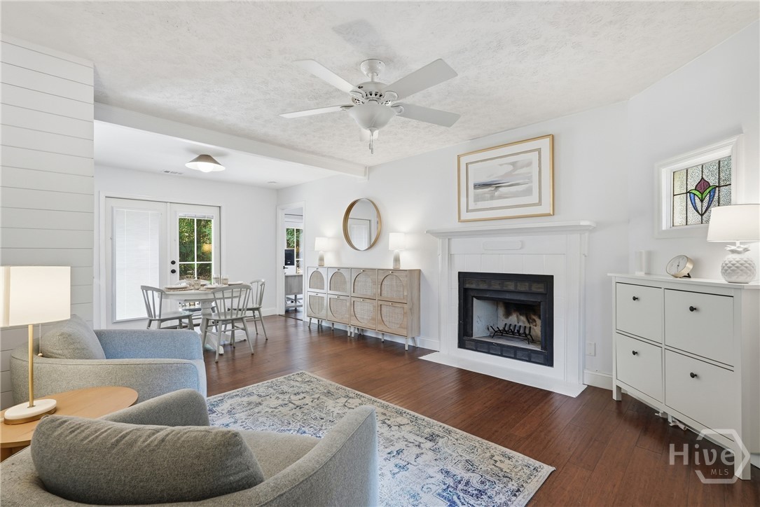 Living room with wood burning fireplace