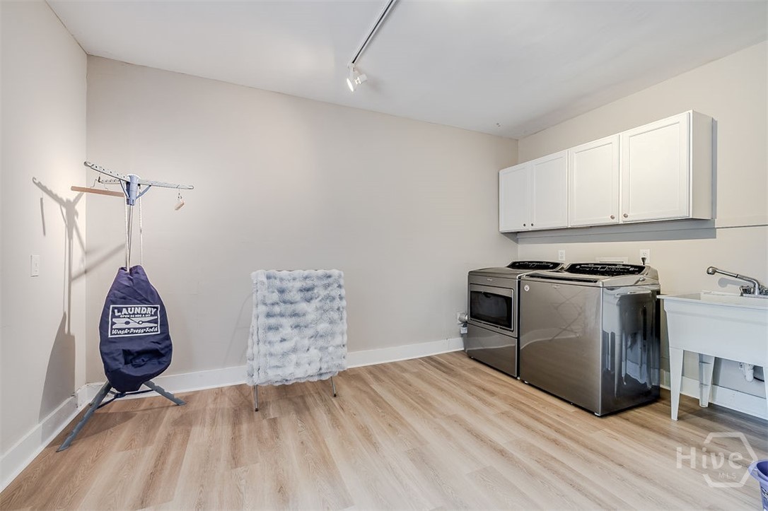 Currently used as jus the laundry room, it could be utilized as an incredible gym/exercise space, toy room, or even a crafts or game room.