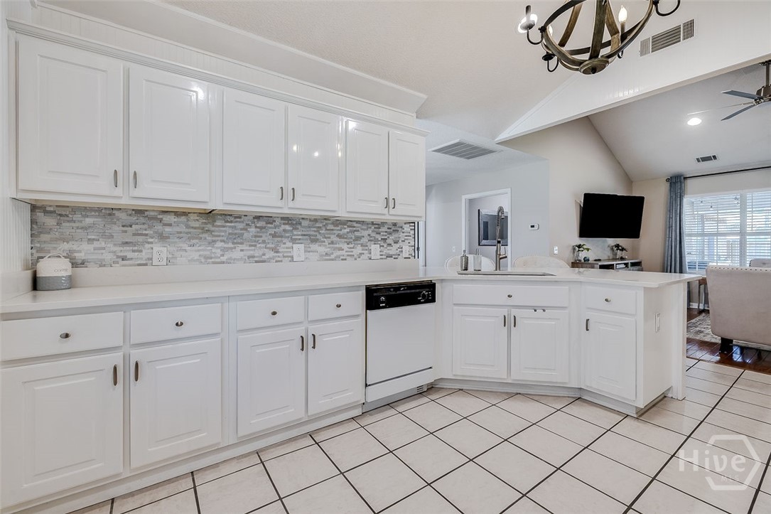 KITCHEN OVERLOOKING SITTING AREA/FORMAL DINING ROOM