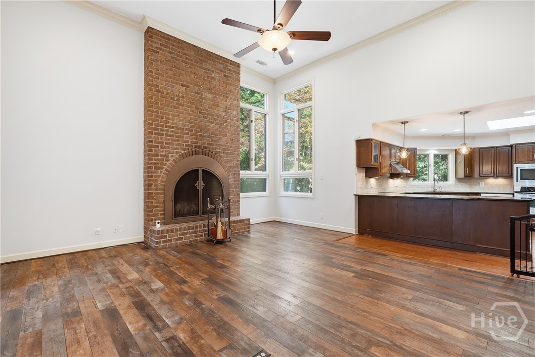 Show stopping masonry fireplace is the focus of the family room.
