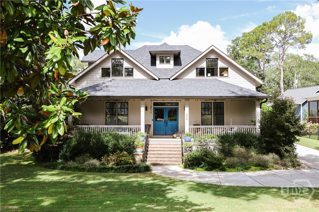 Built in 2016, this Five Points home offers the perfect blend of classic Athens charm and modern comfort. Set on a beautiful tree-lined street, the property features a wide front porch, screened back porch, pool, and detached two-car garage with solar panels. Inside, hardwood floors, high ceilings, and custom millwork frame an open layout ideal for everyday living and entertaining. The kitchen includes quartz countertops, stainless appliances, and a large island overlooking the dining and living areas. The primary suite and two guest rooms are spacious with generous storage and are located on the main level. Upstairs, two additional bedrooms and bonus room offer extra space. Enjoy a private fenced yard with plenty of green space and outdoor living areas. Located just minutes from UGA, The Pine, Bar Bruno, and Jittery Joe’s, this rare newer construction home in Five Points offers timeless style, energy efficiency, and a lifestyle that’s hard to find in Athens.