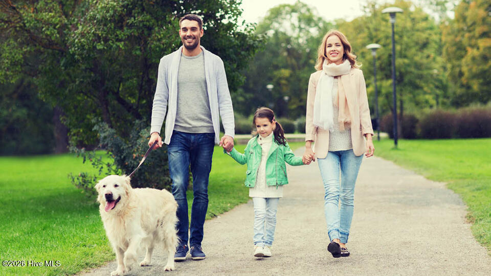 family-walking-dog