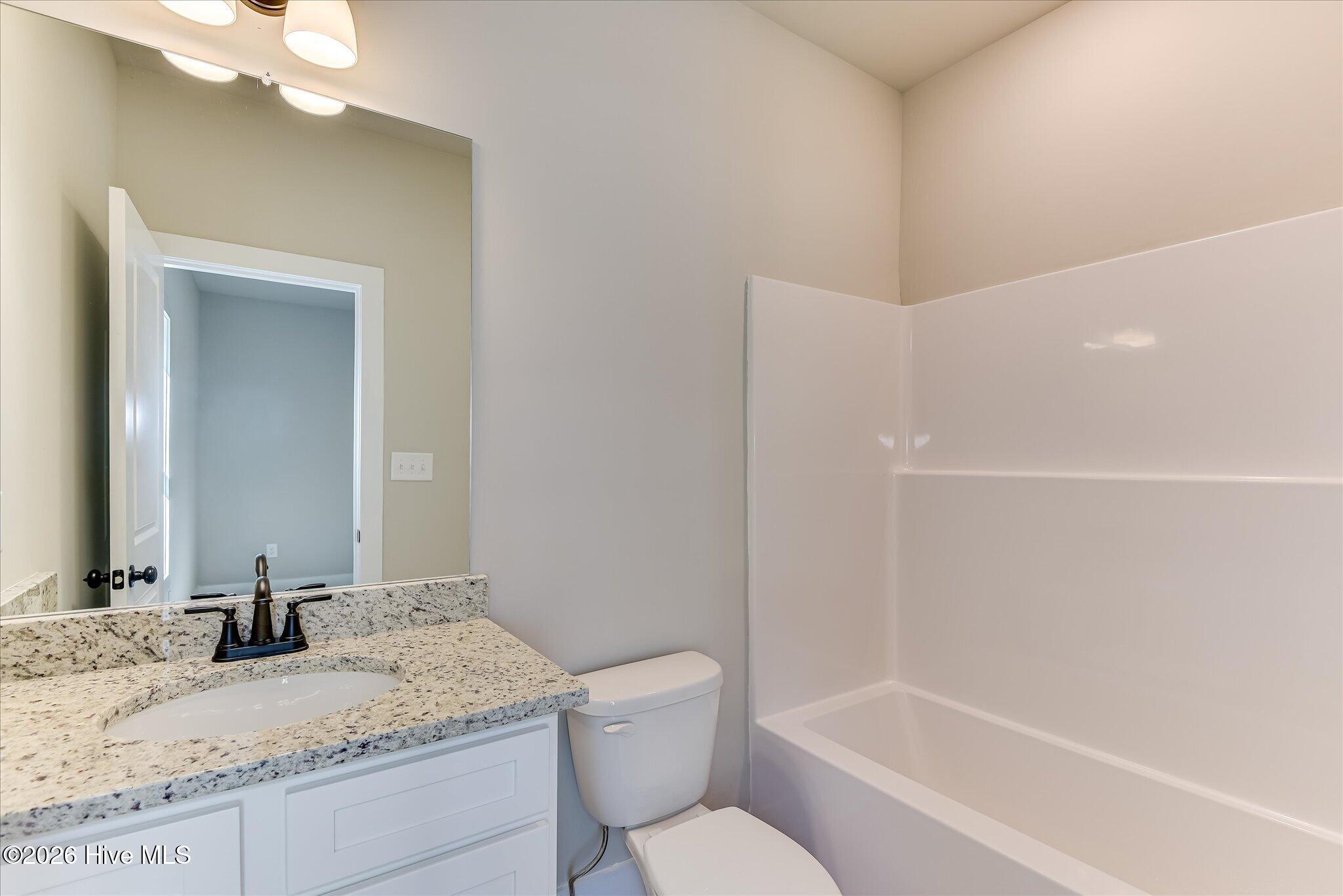 Full bathroom shared by Bedrooms 2 and 3