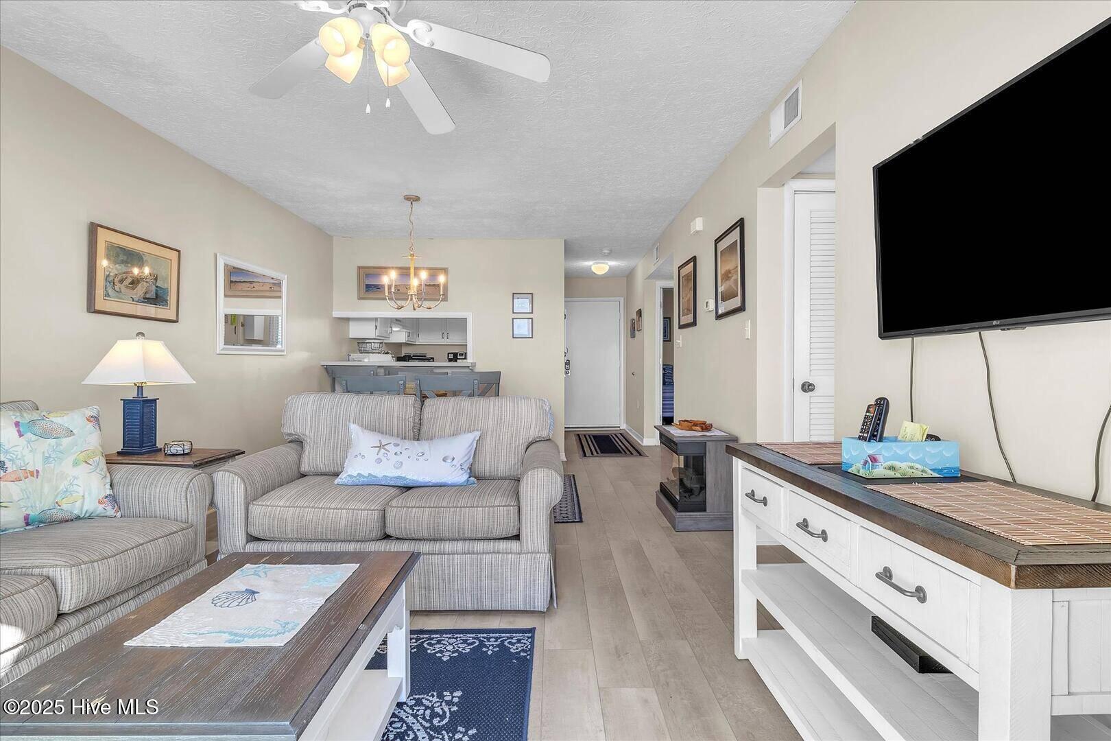 1000 Caswell Beach Road, Oak Island, NC 28465 – photo 15: 1000 Caswell Beach 1303 Living Room