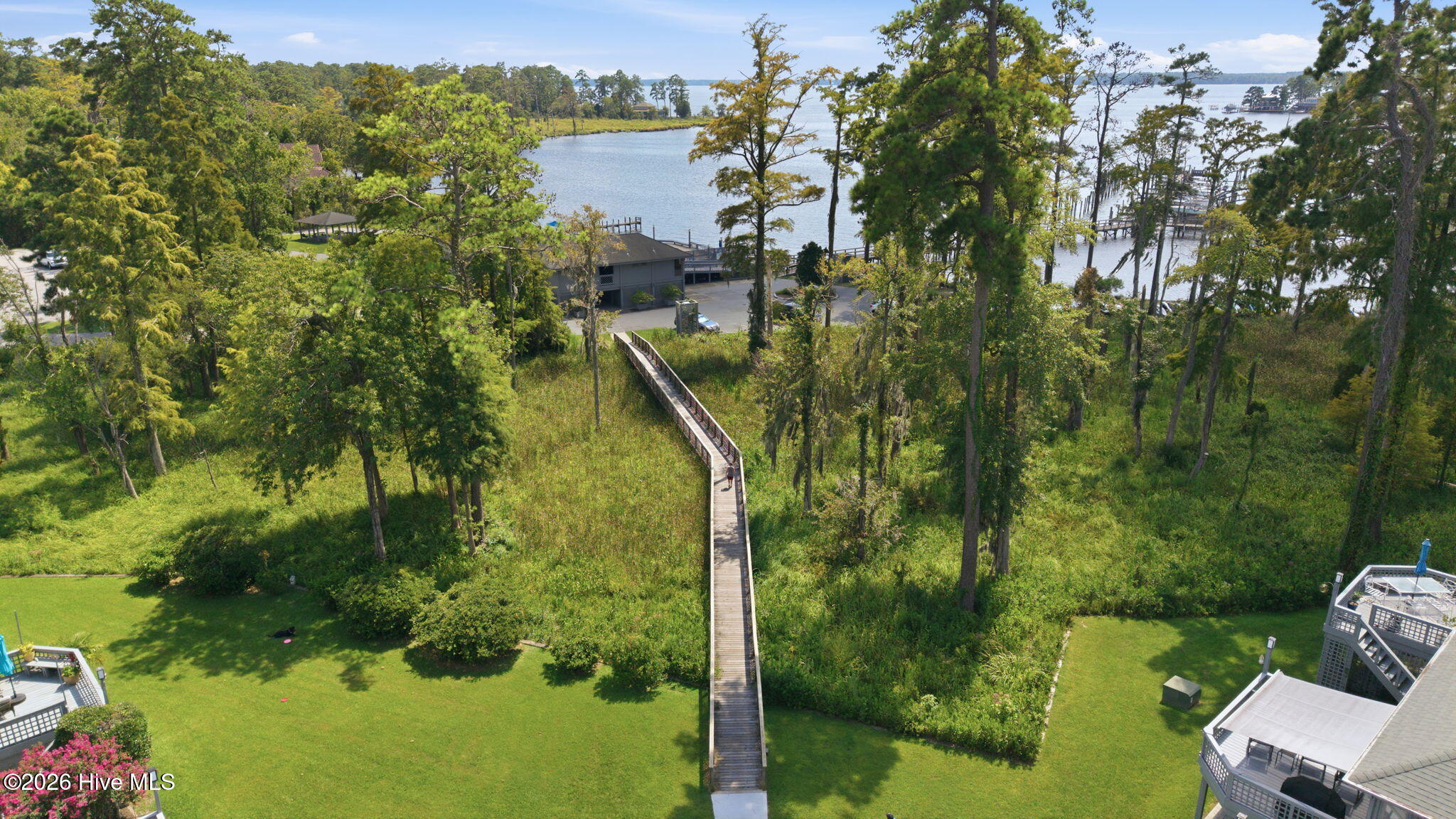 AMENITIES: WALKING BRIDGE TO CLUBHOUSE FROM TOWNHOMES