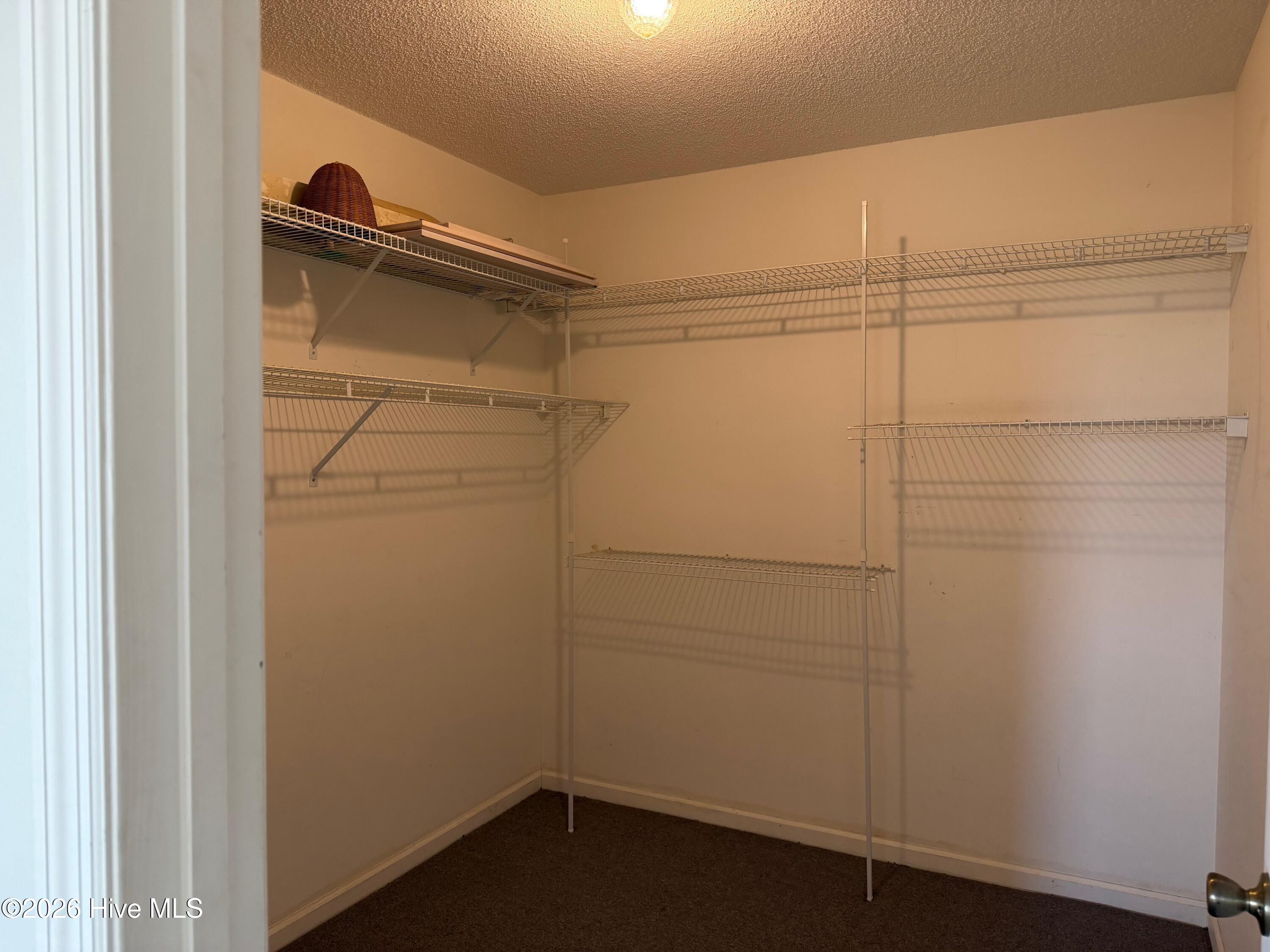 Large Walk-In Closet over garage