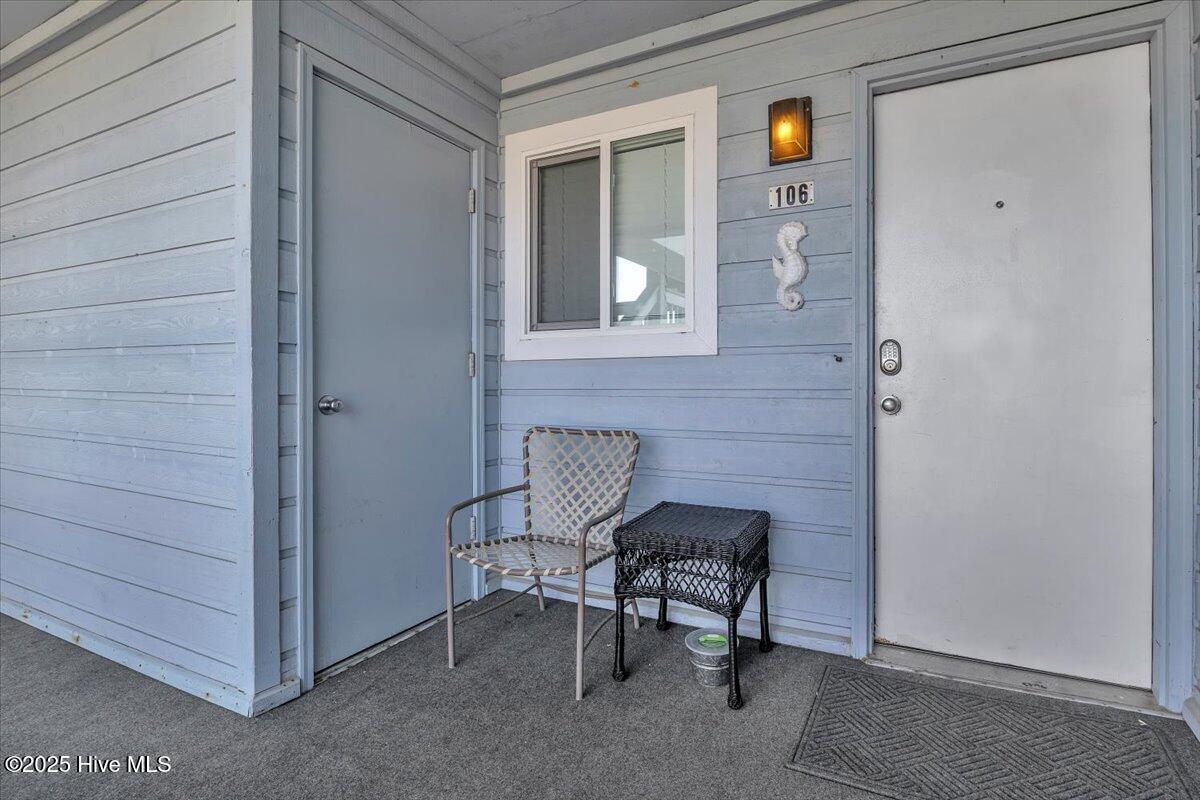 2714 W Beach Drive # 106, Oak Island, NC 28465 – photo 4: Condo entrance